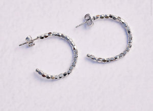 Diamond cut hoop earring