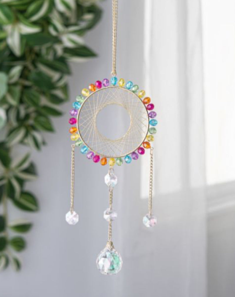 Woven rainbow dream catcher